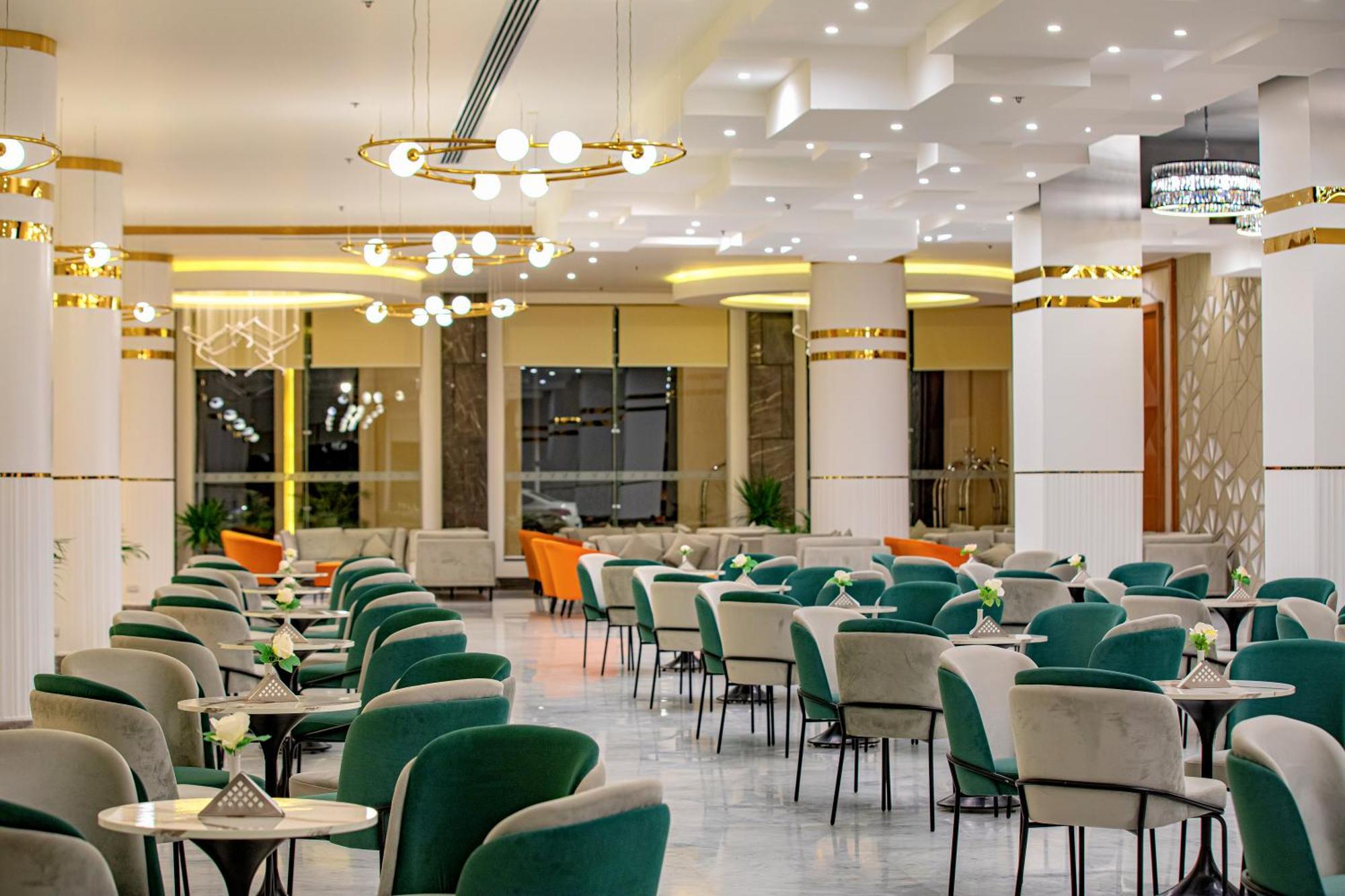 The V Luxury Resort Sahl Hasheesh Hurghada Esterno foto The interior of the restaurant