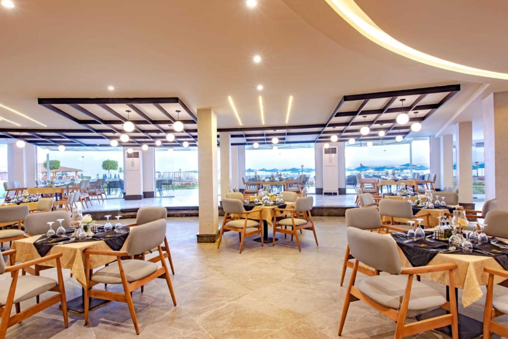 The V Luxury Resort Sahl Hasheesh Hurghada Esterno foto Restaurant